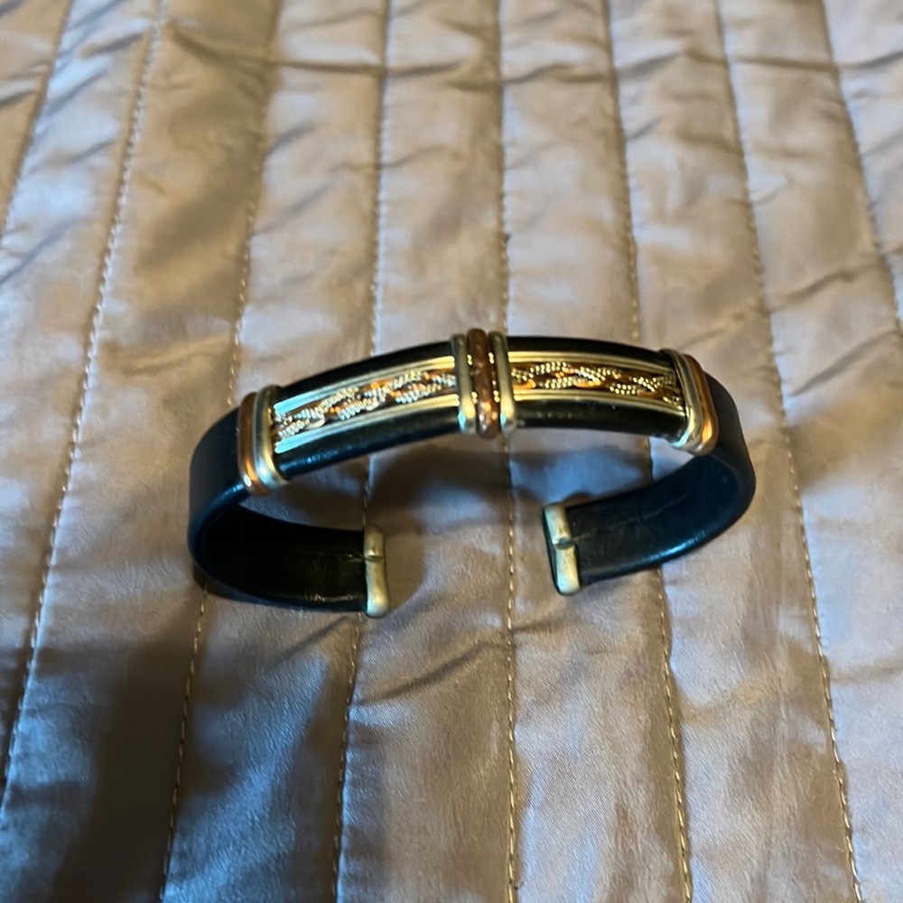 Stainless steel, copper and leather bracket